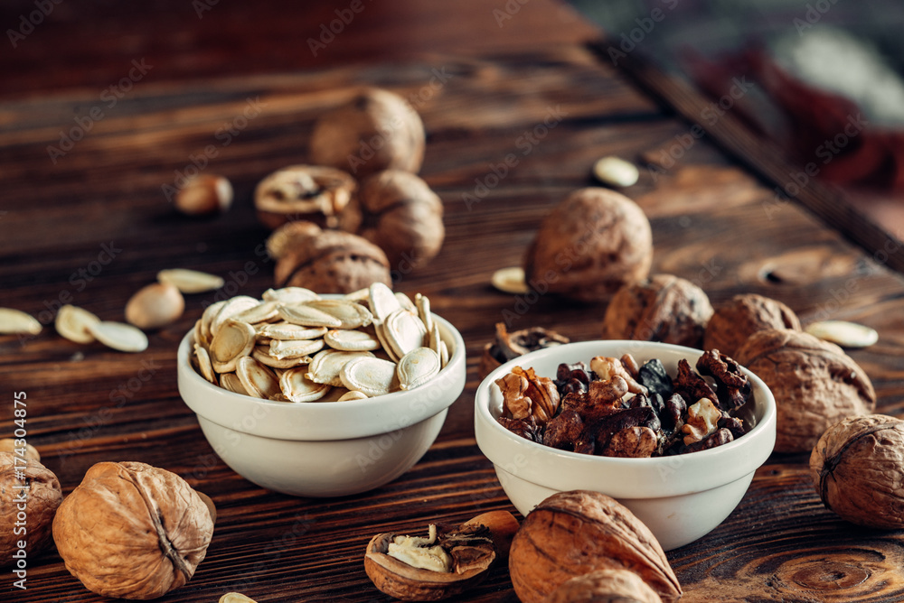 Dried nut is useful and natural on a wooden substrate. Appetizing Dried nut is useful and natural on a wooden substrate. Appetizing