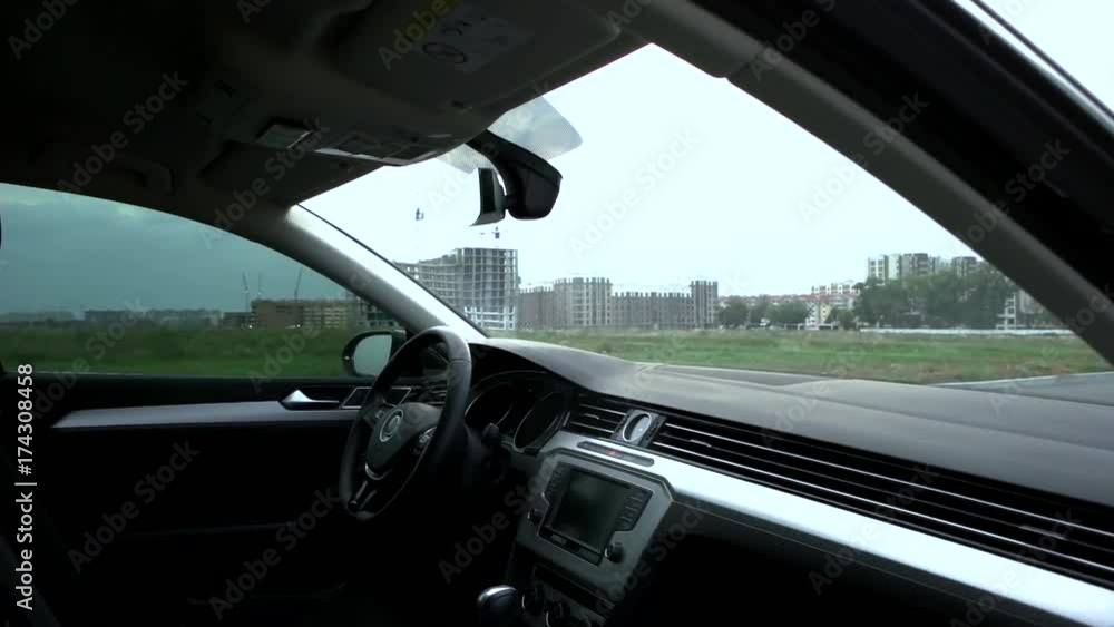 Car interior on urban background. Car interior on urban background.