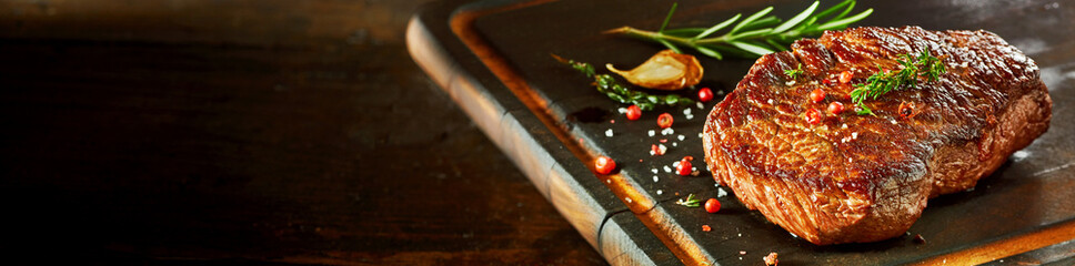 Piece of rump steak on cutting board