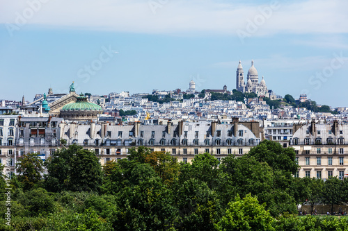 Panorama of Paris with Sacre Coeur Basilica on Montmartre hill. Paris, France