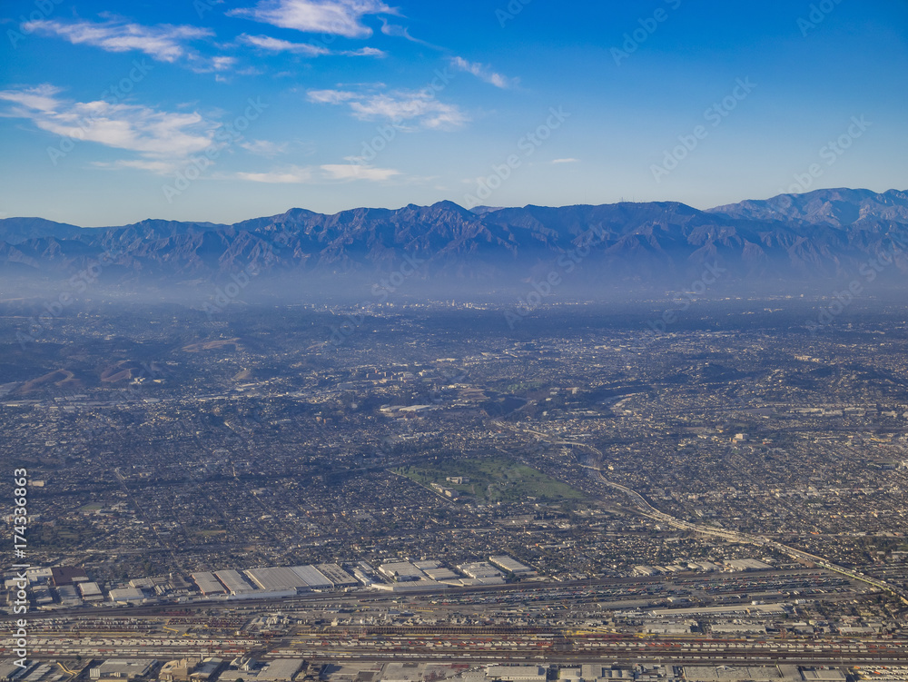 Aerial view of East Los Angeles, Bandini, view from window seat in an airplane