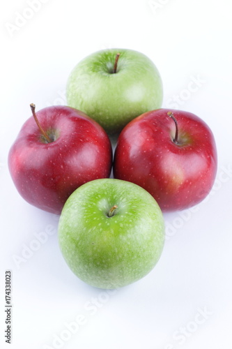 Red and green apples on a white background isolated for designer