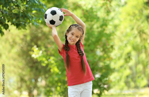 Cute girl with soccer ball ...