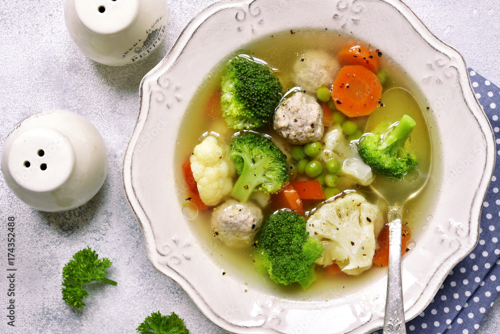 Soup with meatballs and vegetables.Top view with space for text. Soup with meatballs and vegetables.Top view with space for text.
