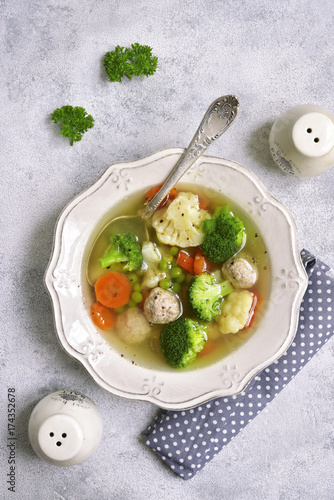 Soup with meatballs and vegetables.Top view with space for text.