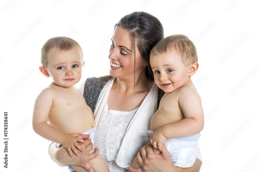 mother and her fraternal boy twins isolated on white mother and her fraternal boy twins isolated on white