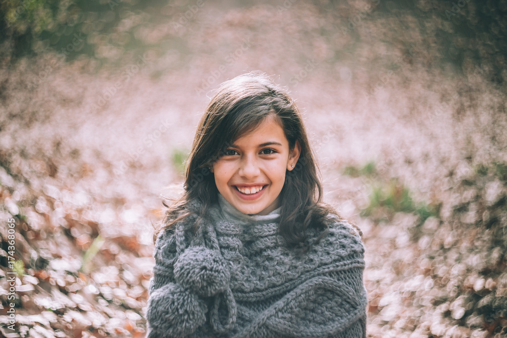 Portrait of a young girl in the woods Portrait of a young girl in the woods