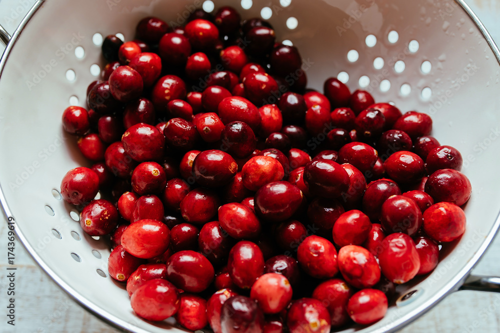 Fresh Washed Cranberries in an Enamel Sieve Fresh Washed Cranberries in an Enamel Sieve