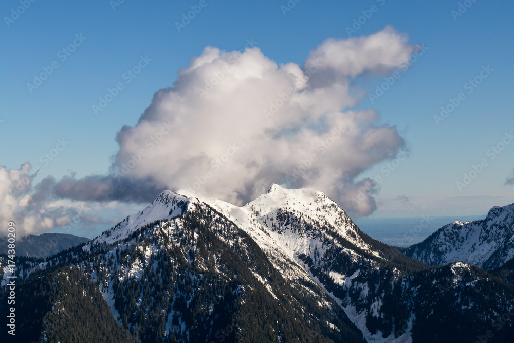 Aerial landscape view of the snow covered mountain range ( Mt Seymour) North of Vancouver, British Columbia, Canada.