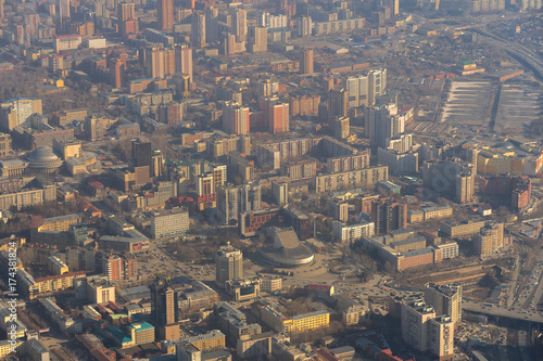 Morning city Novosibirsk view from airplane