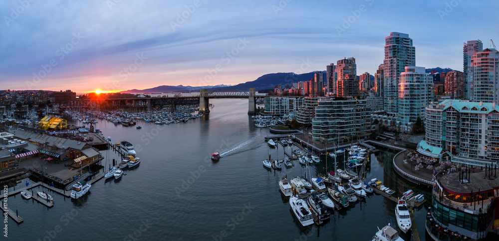 Panoramic View of False Creek in Downtown Vancouver, British Columbia, Canada. Taken from an aerial perspective during a colorful sunset.