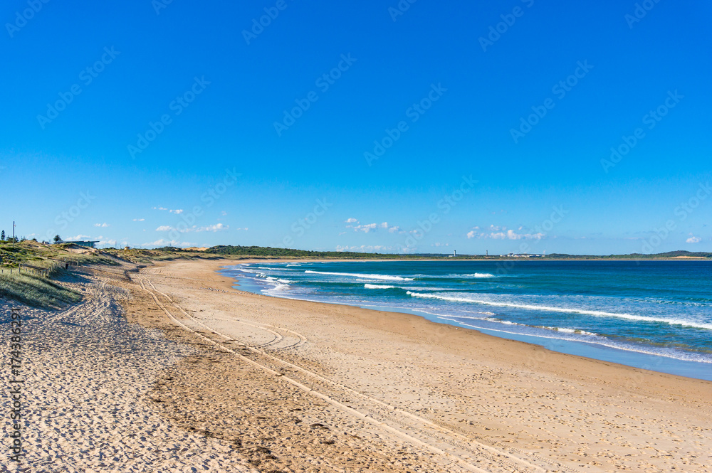 Beautiful tropical beach with sand and soft waves Beautiful tropical beach with sand and soft waves