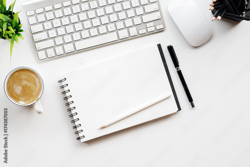 Stylish minimalistic workplace with keyboard, notebook, office plant, notebook, glasses in flat lay style. White background. Top view. Stylish minimalistic workplace with keyboard, notebook, office plant, notebook, glasses in flat lay style. White background. Top view.