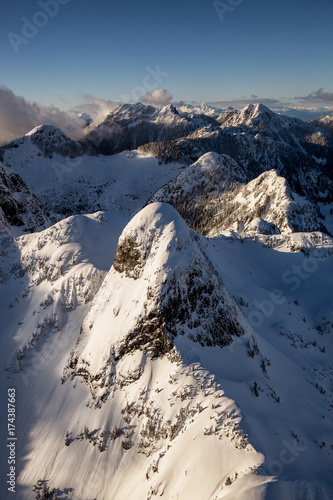 Aerial landscape view of The Lions Mountain Peaks. Picture taken in North Shore of Vancouver  British Columbia  Canada  near Howe Sound.