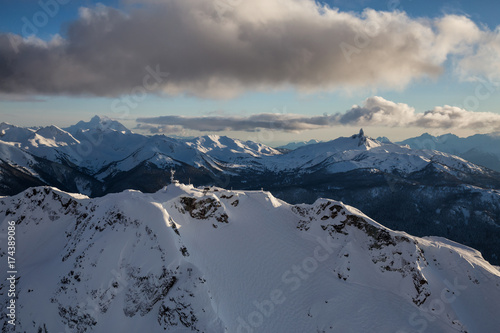 Whistler Mountain  BC  Canada  from an aerial perspective. Picture taken during a cloudy winter sunset.