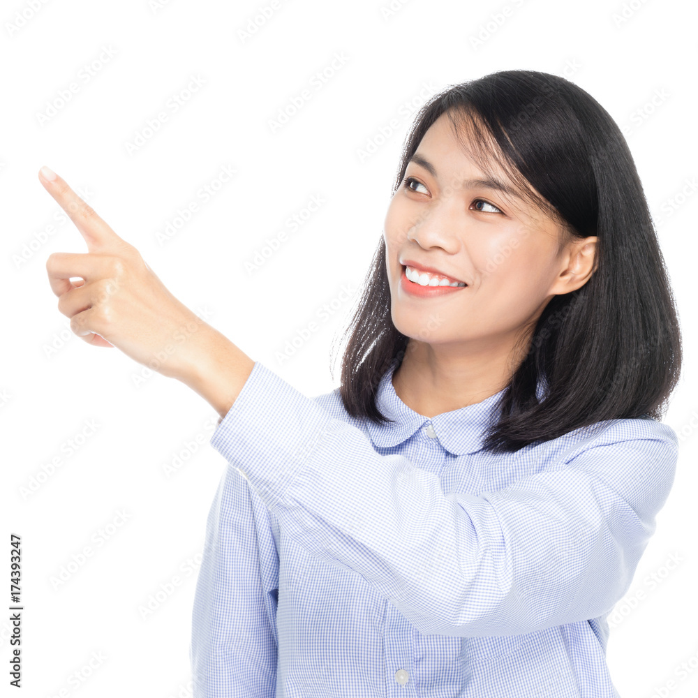 Portrait of a beautiful asian business woman smiling and pointed the finger to left side. Isolated on white background Portrait of a beautiful asian business woman smiling and pointed the finger to left side. Isolated on white background
