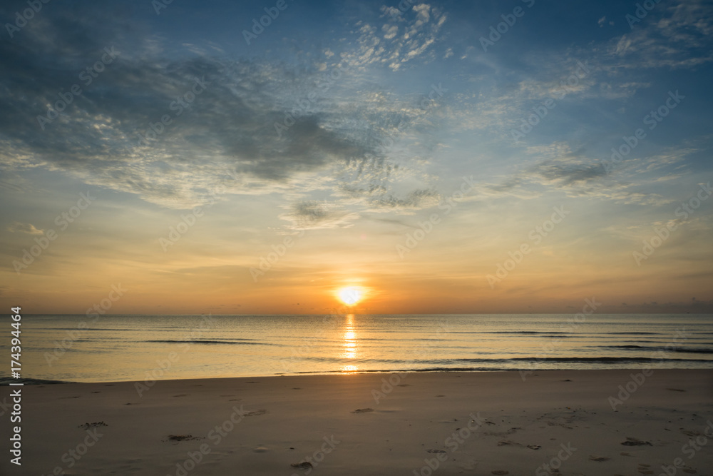At a beach in Hua Hin city, Thailand. Sunrise over the sea, Calm ocean with Colorful dawn over the sea. At a beach in Hua Hin city, Thailand. Sunrise over the sea, Calm ocean with Colorful dawn over the sea.