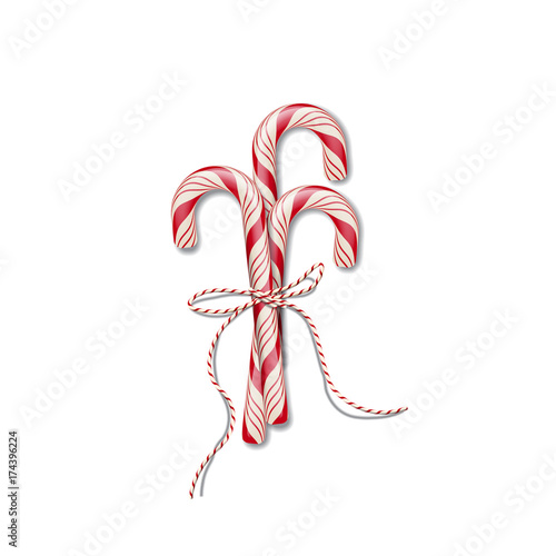 Christmas candy canes with red ribbon. Vector Christmas or New Year design element.