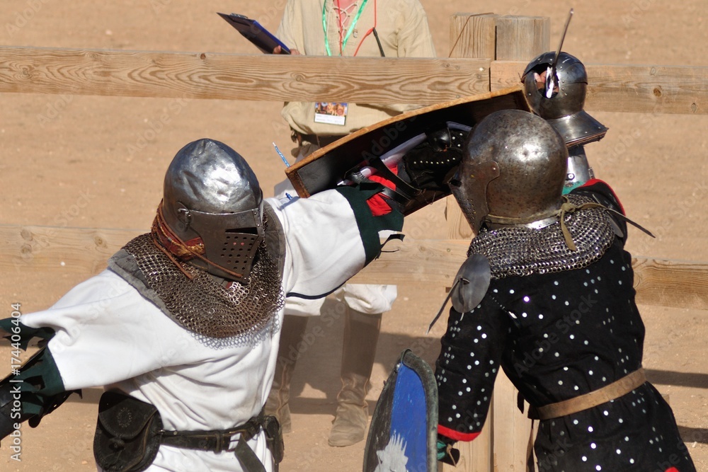 Fototapeta premium Medieval knights fighting in tournament