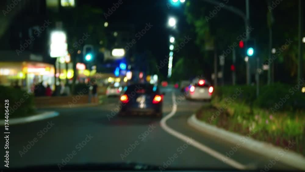 A night time shot of a street in bokeh. A night time shot of a street in bokeh.