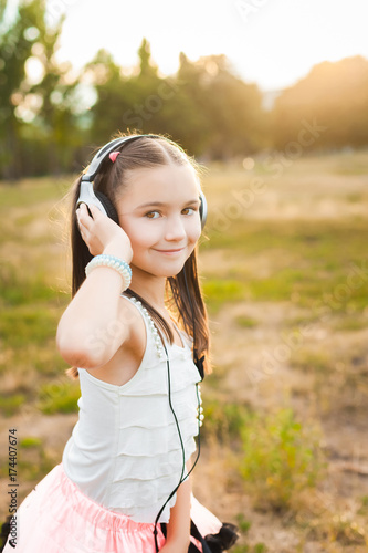 joyful girl listening music