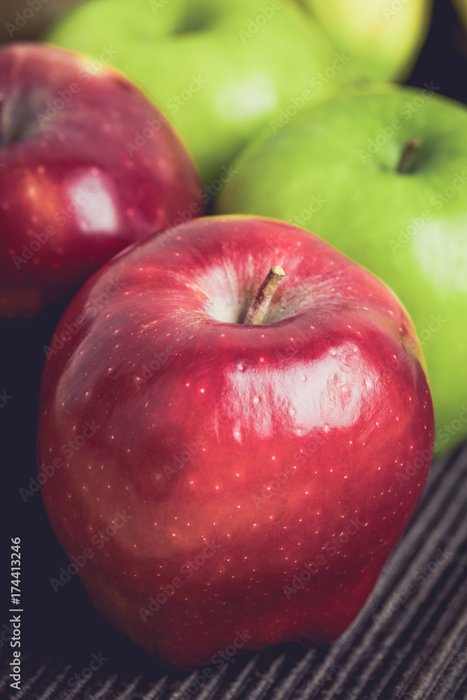 Green and red of apples on black background Green and red of apples on black background