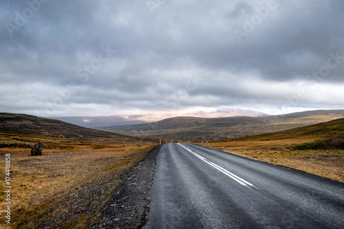 Scenic view of remote road on Iceland surrounded by dramatic landscape.