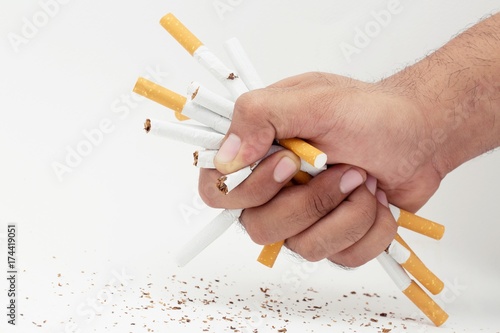 Man trying to give up smoking cigarette . Concept world no tobacco day campaign.