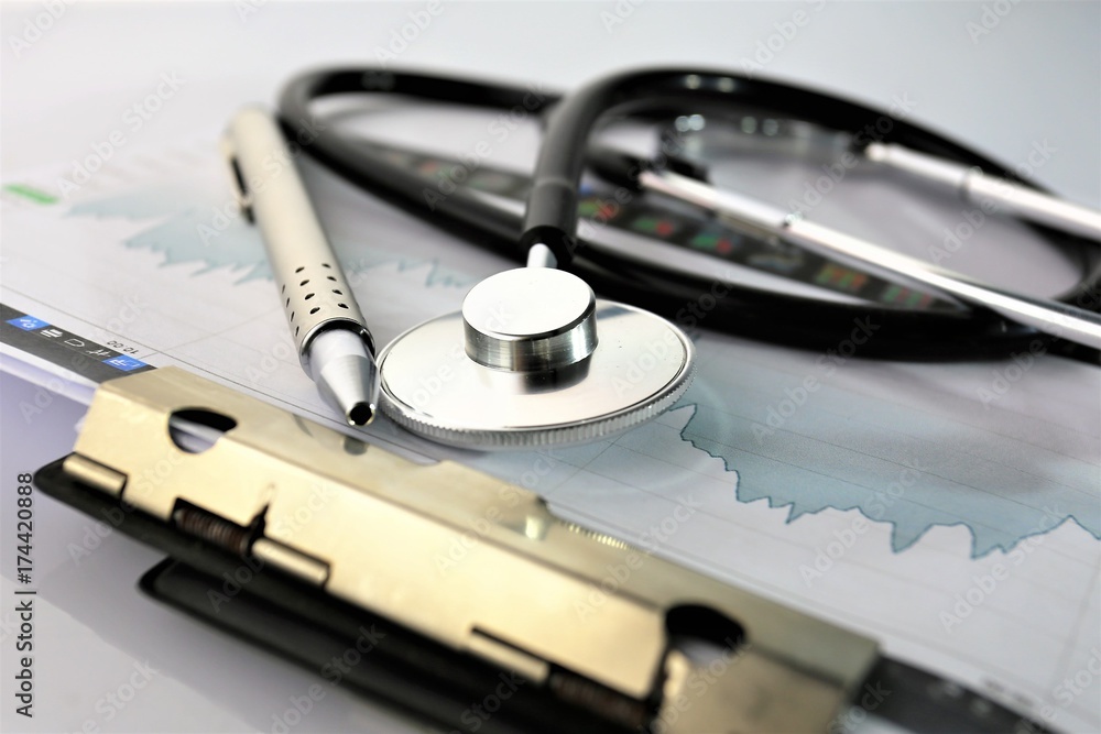 An concept Image of a medical clipboard with different Charts and scenario An concept Image of a medical clipboard with different Charts and scenario