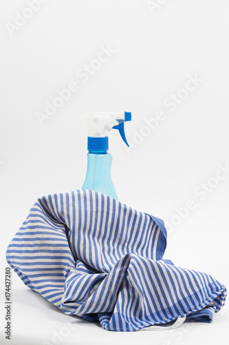 Dishtowel and bottle of glass cleaner