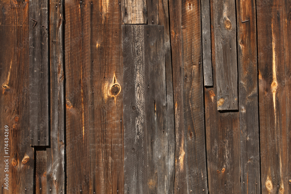 Mahogany wooden texture and background with scratches, brown wood planks for display Mahogany wooden texture and background with scratches, brown wood planks for display