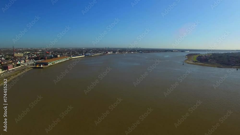 NEW ORLEANS, LA - FEBRUARY 2016: Aerial view of city skyline. New Orleans attracts 15 million visitors annually. NEW ORLEANS, LA - FEBRUARY 2016: Aerial view of city skyline. New Orleans attracts 15 million visitors annually.