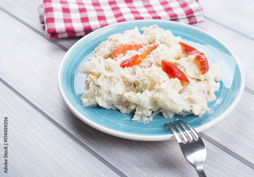 Typical dish of spain, russian salad with fork. Mediterranean diet. Typical dish of spain, russian salad with fork. Mediterranean diet.