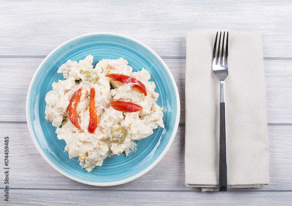 Typical dish of spain, russian salad with fork. Mediterranean diet. Typical dish of spain, russian salad with fork. Mediterranean diet.