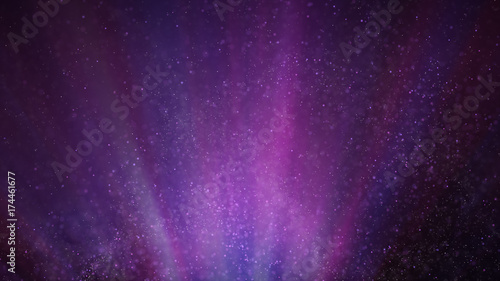 фотографія Glowing particles flies in light beams