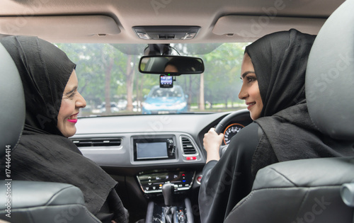 Arabic Woman Couple Traveling By Car. © kanchitdon