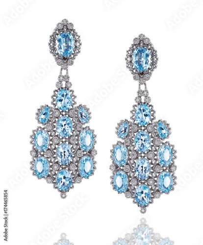 A pair of white gold earrings with diamonds and topazes