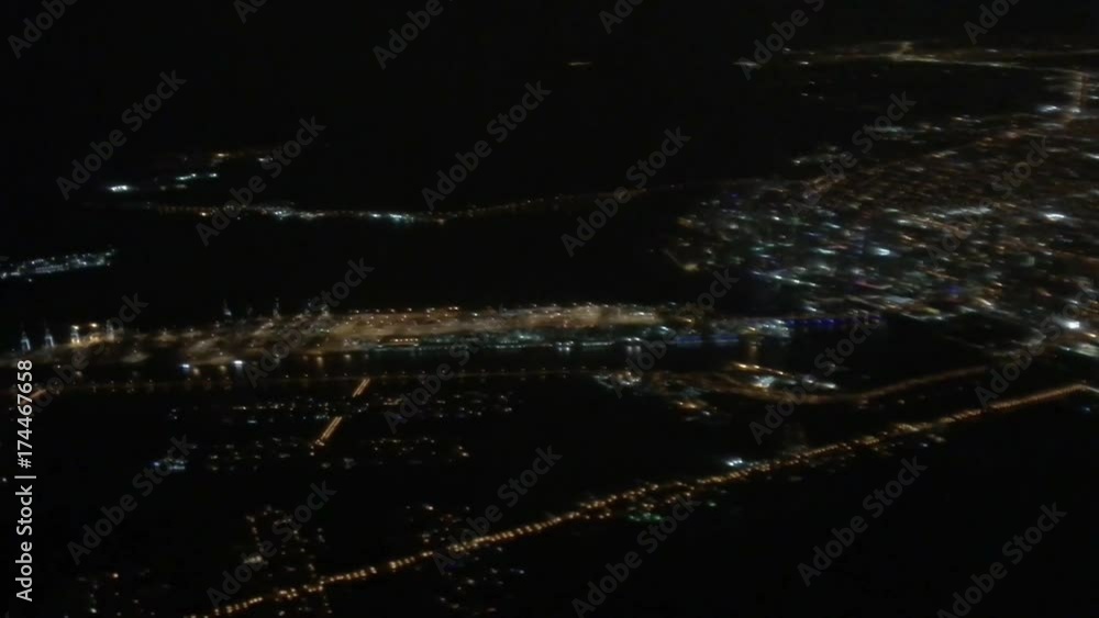 City skyline from the airplane at night. City skyline from the airplane at night.