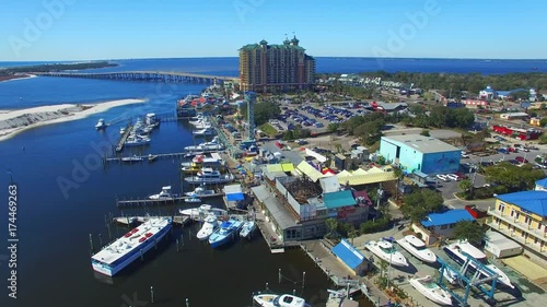 DESTIN, FLORIDA - FEBRUARY 2016: City harbor and coastline on a beautiful day. Destin is a major Florida destination. photo