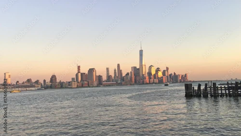 Jersey City and Manhattan at sunset. Jersey City and Manhattan at sunset.