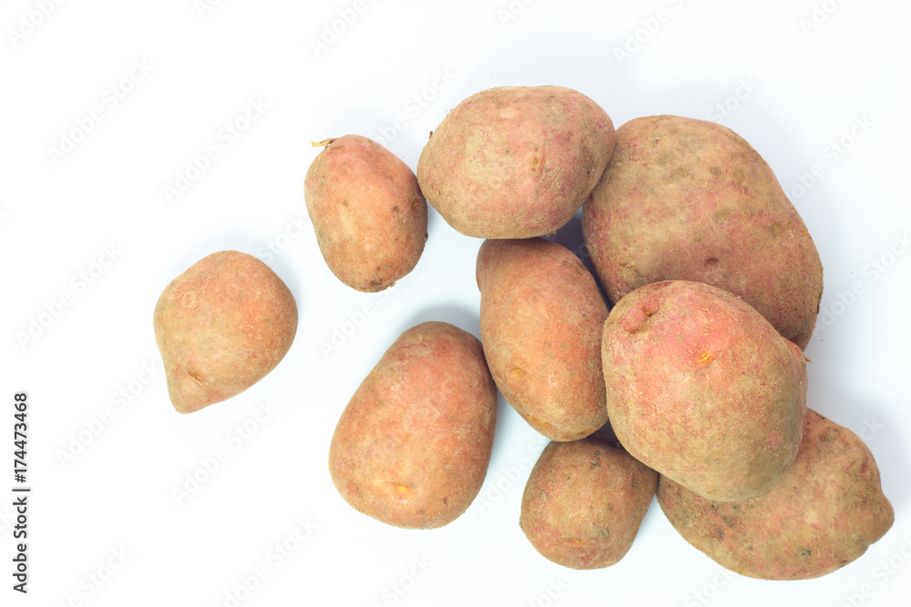 Organic food concept top view fresh red potatoes on white background with copy space Organic food concept top view fresh red potatoes on white background with copy space