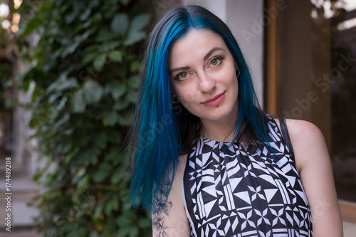 Goth punk beautiful girl with blue hair