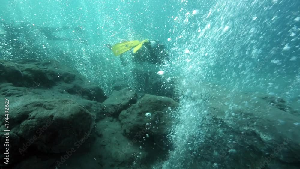 Scuba diving among hot bubbles from underwater volcano, Pulau Weh, Aceh, Indonesia Scuba diving among hot bubbles from underwater volcano, Pulau Weh, Aceh, Indonesia