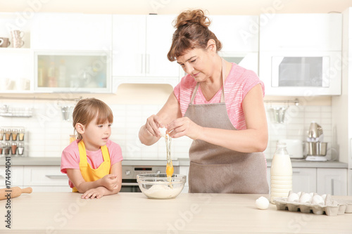 Cute little girl and her gr...