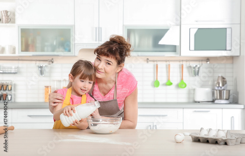 Cute little girl and her gr...