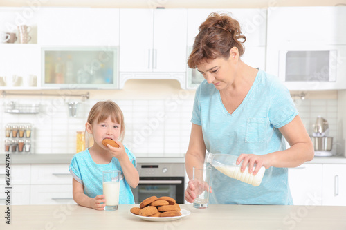 Cute little girl and her gr...