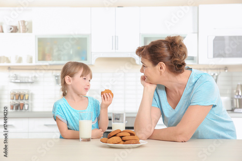 Cute little girl and her gr...