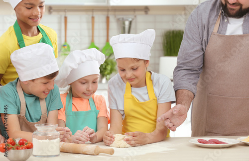 Group of children and teach...