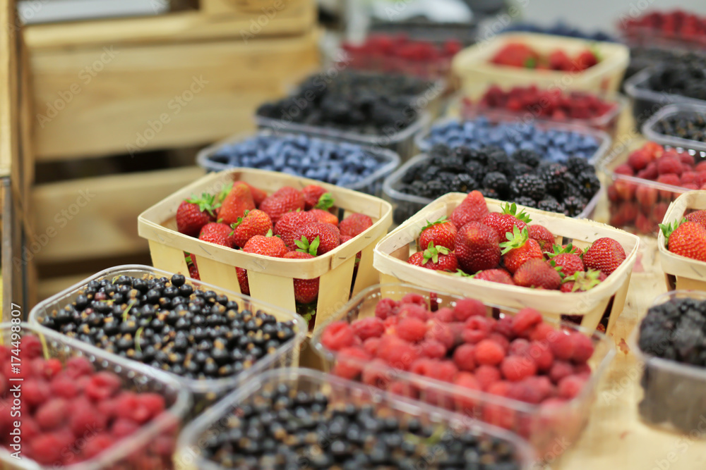 Assortment of fresh berries at market Assortment of fresh berries at market