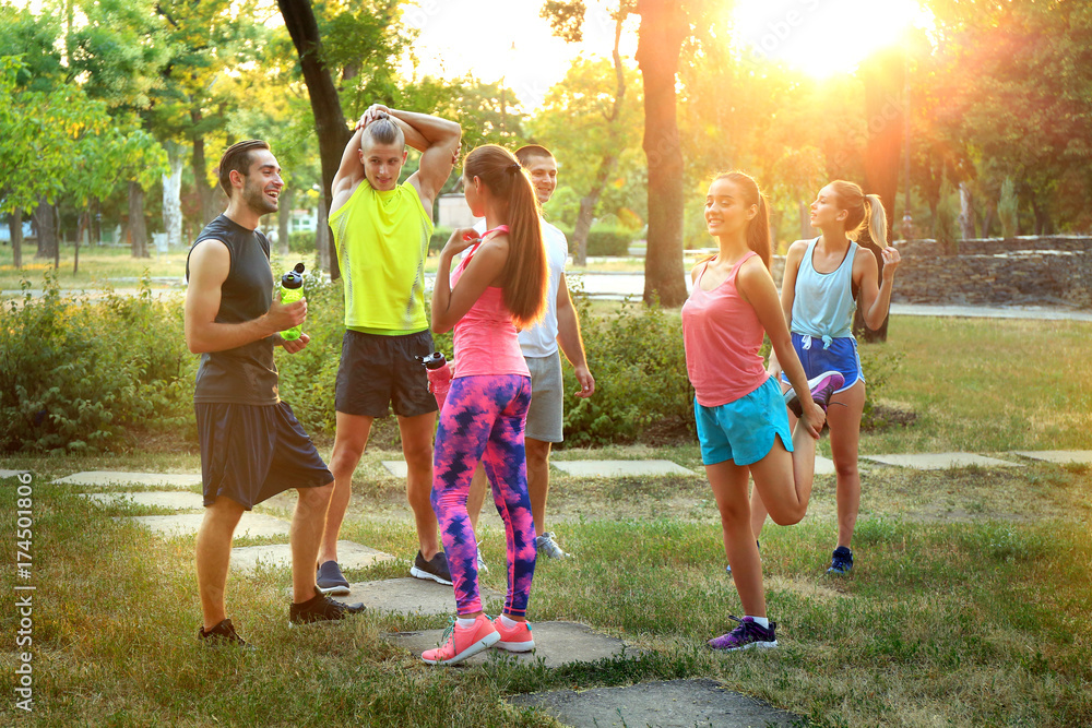 Fototapeta premium Group of young sporty people outdoors